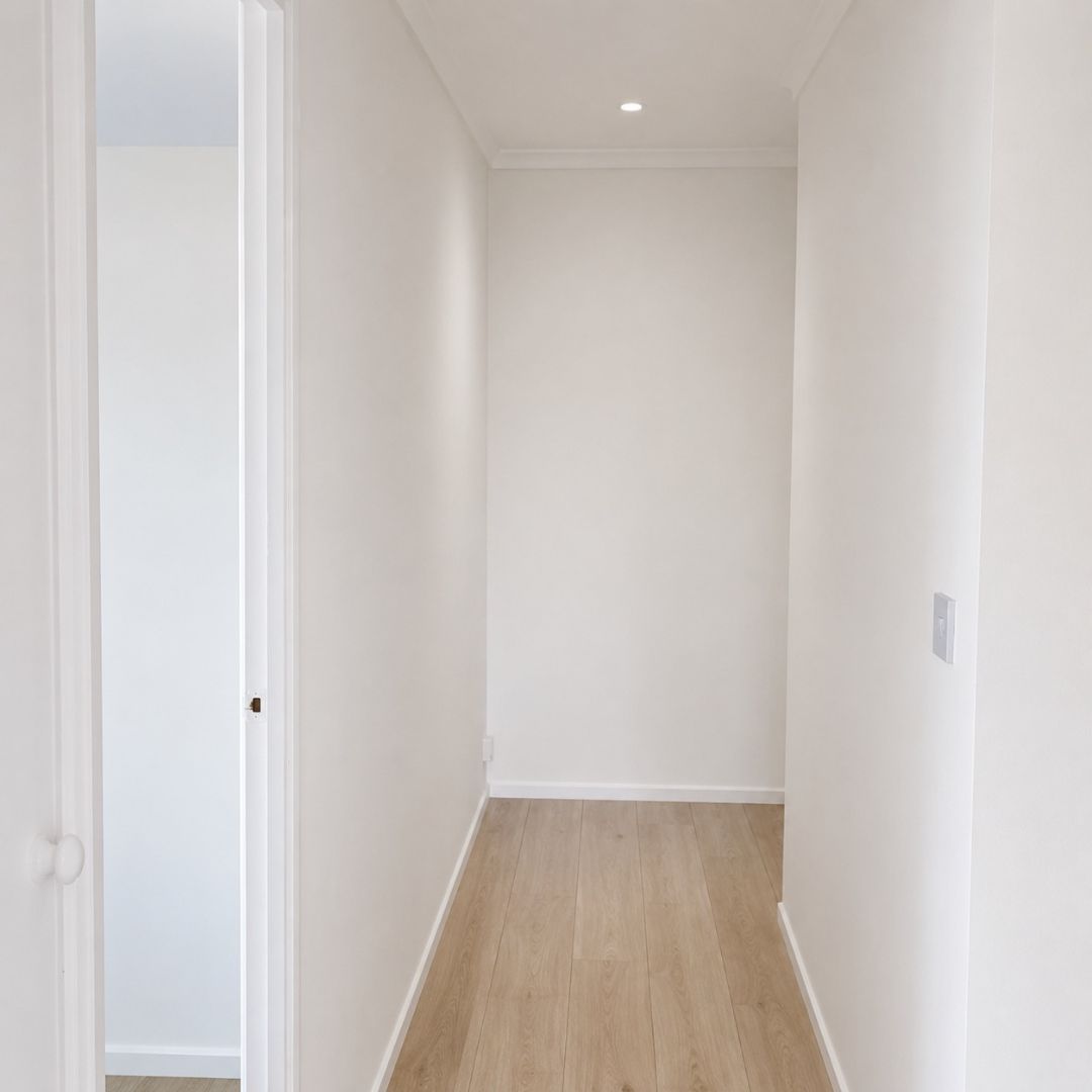 Completed hallway following renovation of a one-bedroom flat in Greenwich SE8