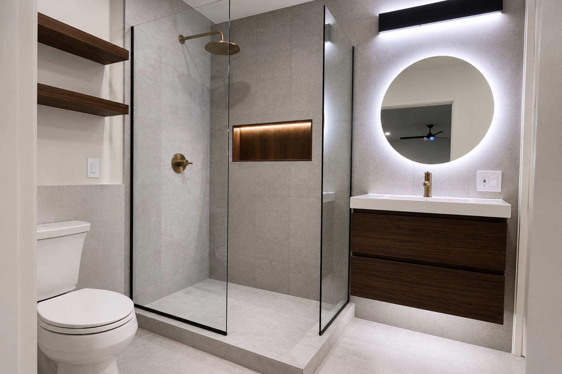 Completed en suite bathroom renovation in Chiswick with walk-in shower, illuminated niche and timber-effect vanity