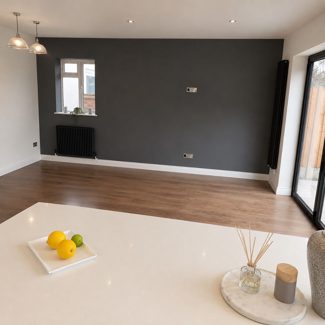 Two-tone grey kitchen and aluminium bifold doors in completed Barnet renovation