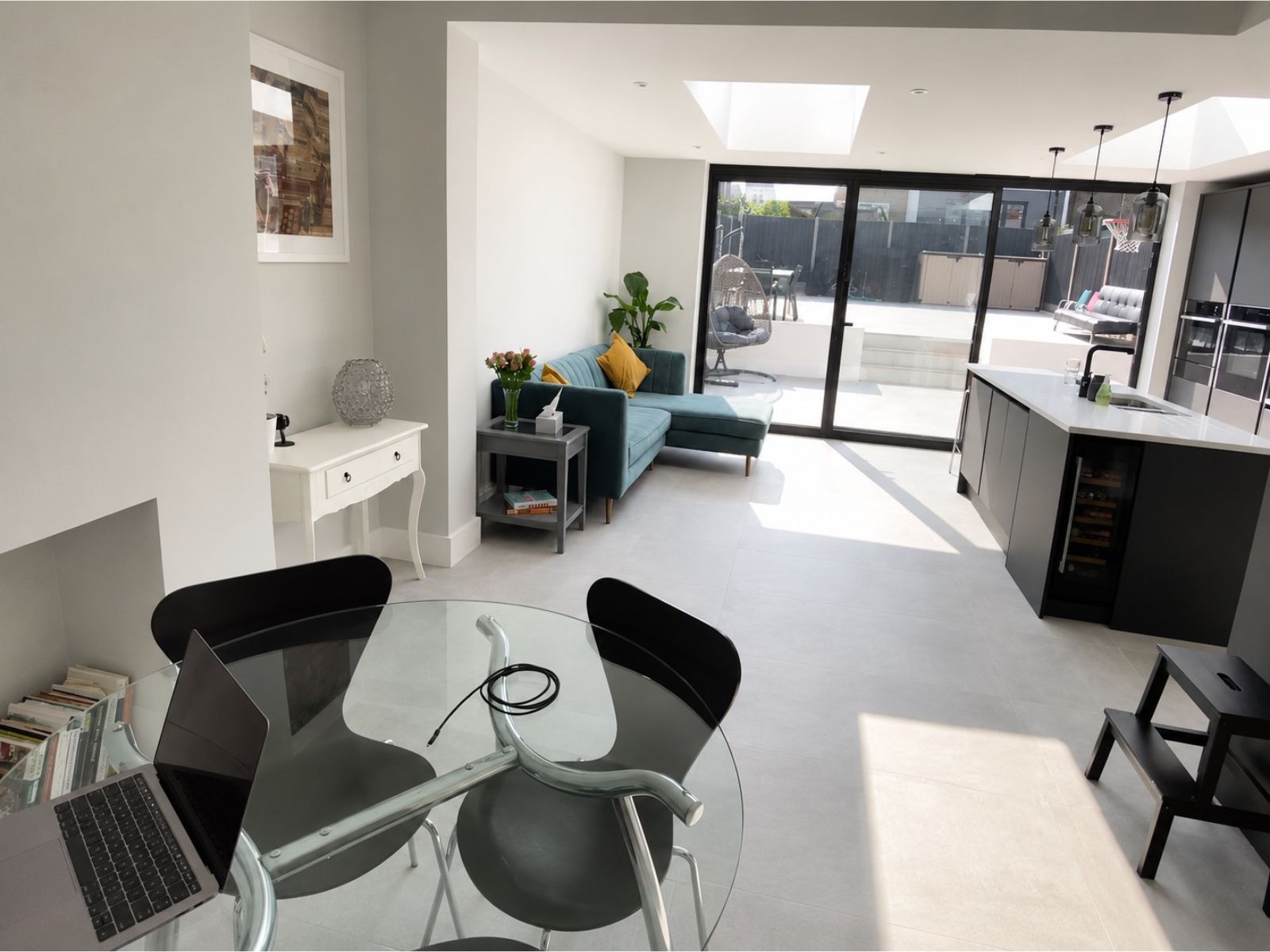 Finished dark-grey kitchen and island in the Bromley rear extension
