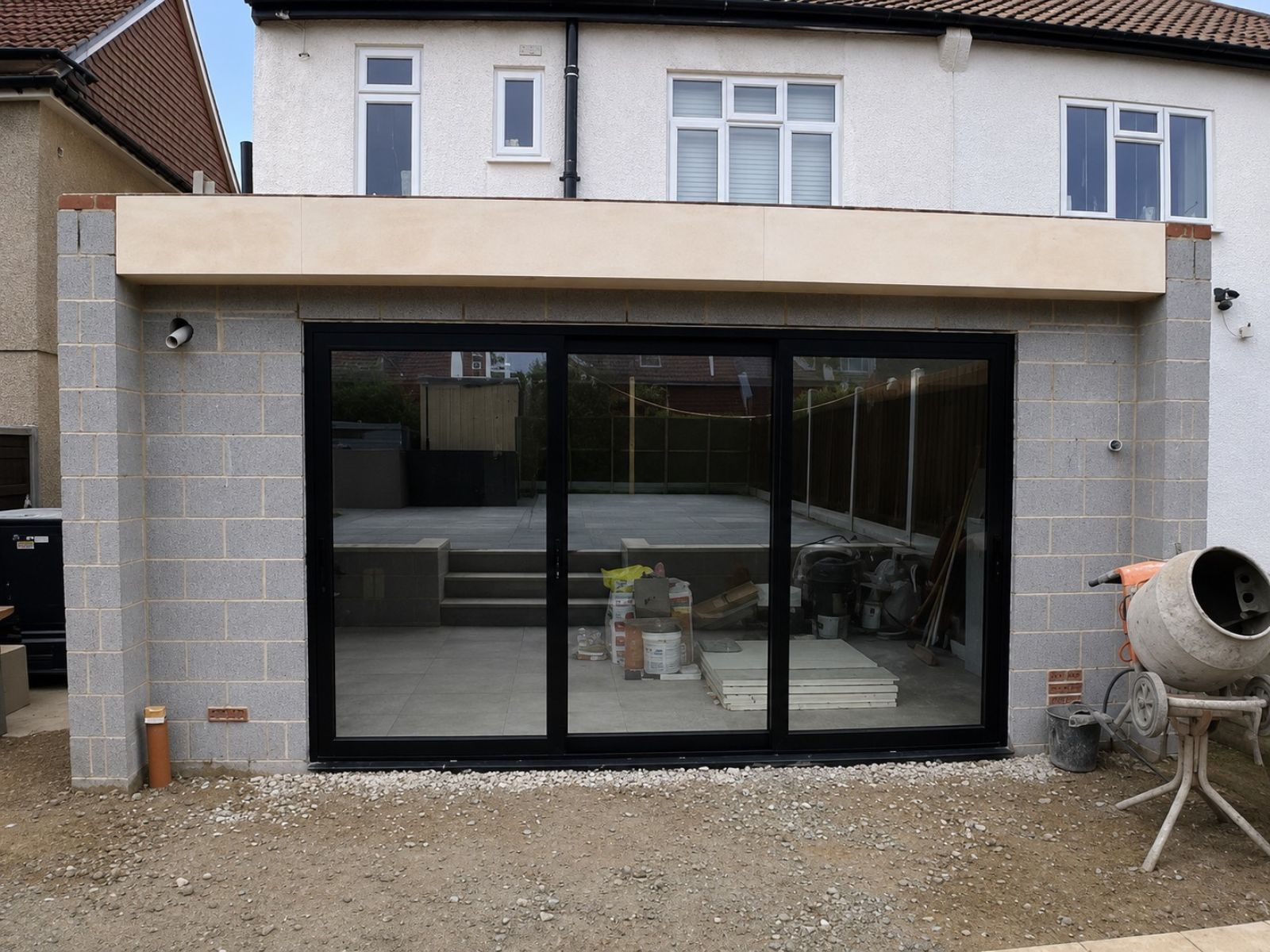 Black-framed sliding doors installed in the Bromley rear extension