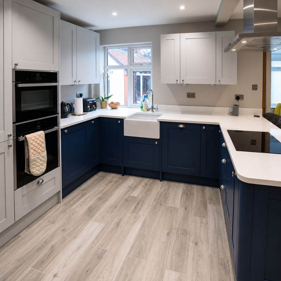 Floor tiling and kitchen installation in progress during the Deptford renovation