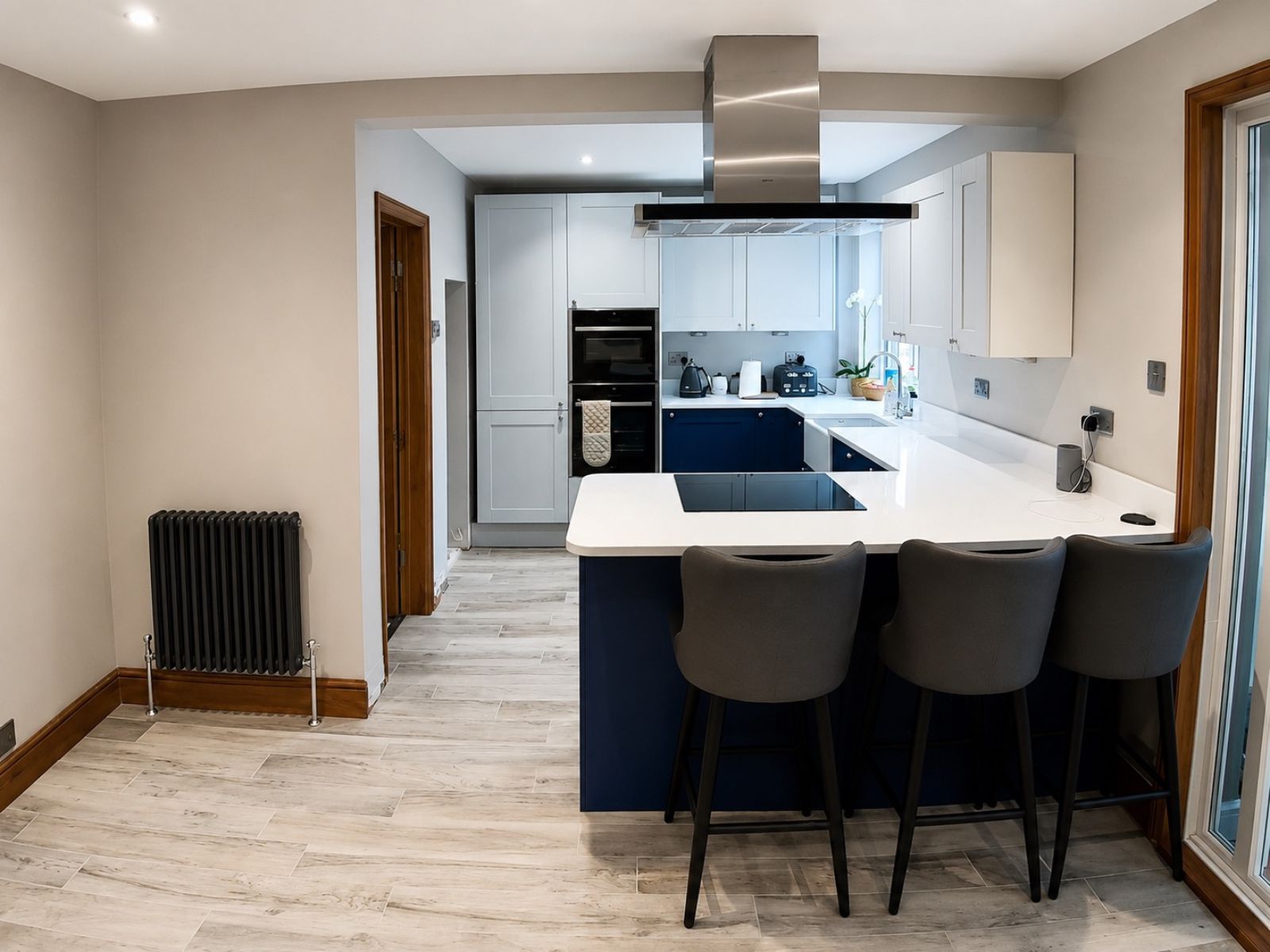 Completed open-plan kitchen and living area following load-bearing wall removal in Deptford, London