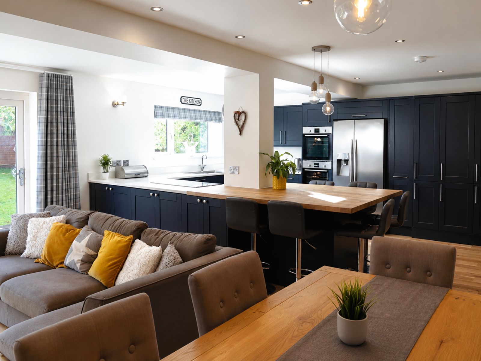 Completed open-plan London room following load-bearing wall removal